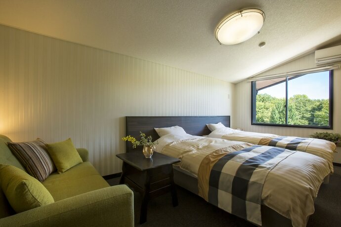Imagen de la habitación del Hotel Hakuba Berghaus. Foto 18