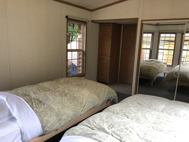 Imagen de la habitación del Hotel Hakuba Canadian Lodge. Foto 27