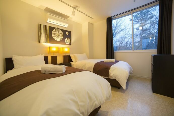 Imagen de la habitación del Hotel Hakuba Echo. Foto 13