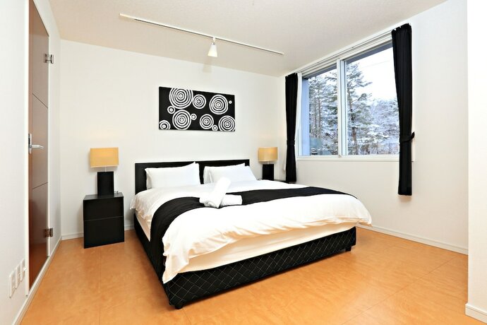Imagen de la habitación del Hotel Hakuba Echo. Foto 19