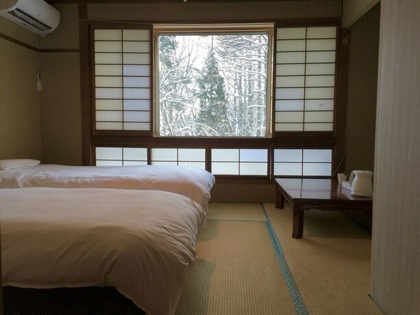 Imagen de la habitación del Hotel Hakuba Landmark Happo Lodge. Foto 17