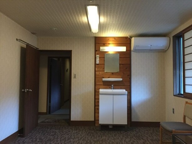 Imagen de la habitación del Hotel Hakuba Landmark Happo Lodge. Foto 19