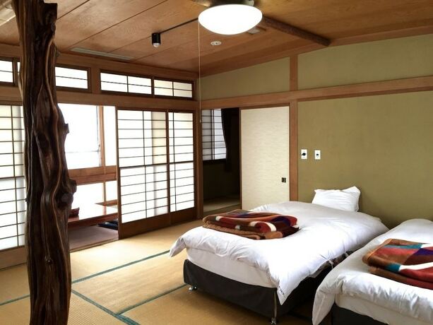 Imagen de la habitación del Hotel Hakuba Landmark Happo Lodge. Foto 22
