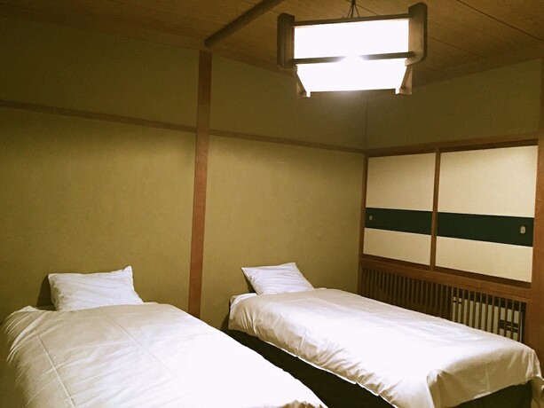 Imagen de la habitación del Hotel Hakuba Landmark Happo Lodge. Foto 23