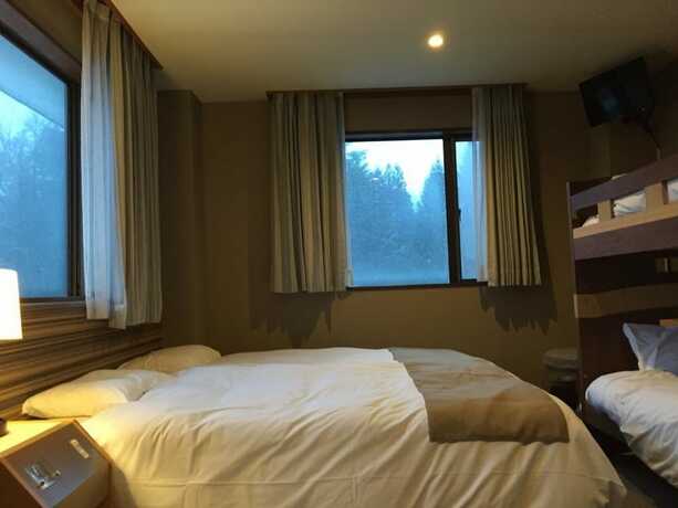 Imagen de la habitación del Hotel Hakuba Landmark Iwatake Lodge. Foto 21