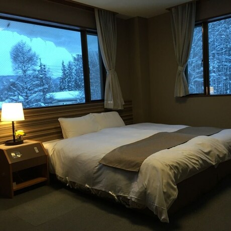 Imagen de la habitación del Hotel Hakuba Landmark Iwatake Lodge. Foto 22