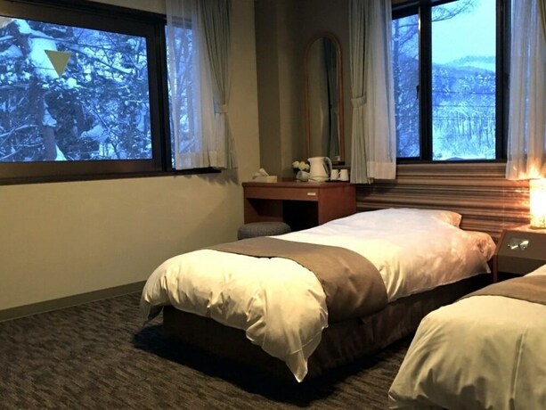 Imagen de la habitación del Hotel Hakuba Landmark Iwatake Lodge. Foto 23