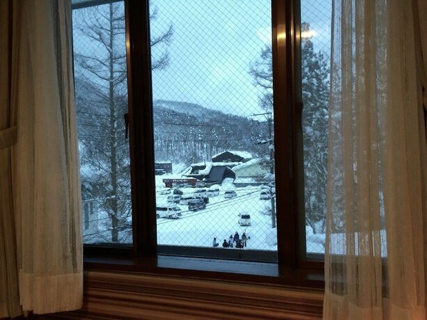 Imagen de la habitación del Hotel Hakuba Landmark Iwatake Lodge. Foto 24