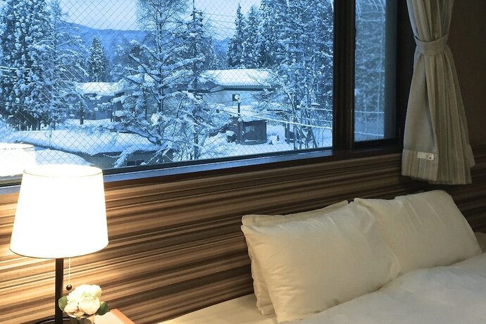 Imagen de la habitación del Hotel Hakuba Landmark Iwatake Lodge. Foto 27