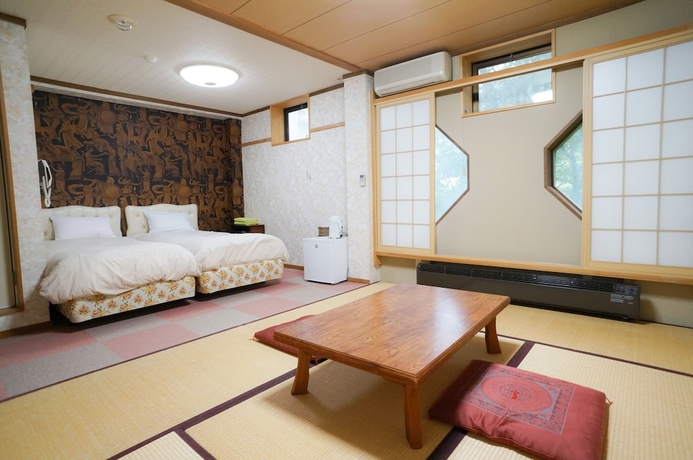 Imagen de la habitación del Hotel Hakuba M&auml;rchen House. Foto 2