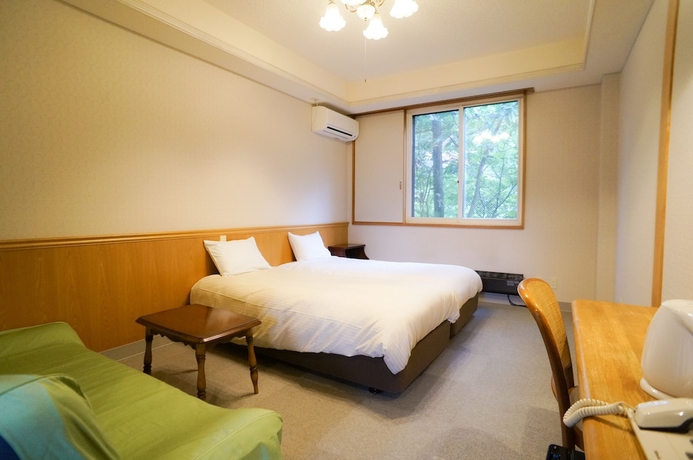 Imagen de la habitación del Hotel Hakuba M&auml;rchen House. Foto 7