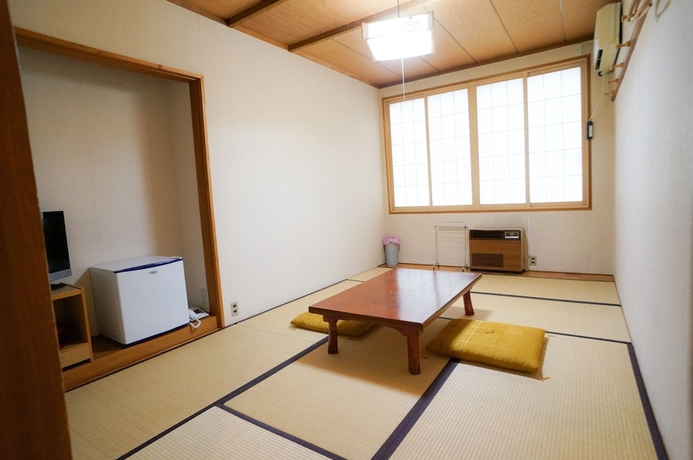 Imagen de la habitación del Hotel Hakuba M&auml;rchen House. Foto 11