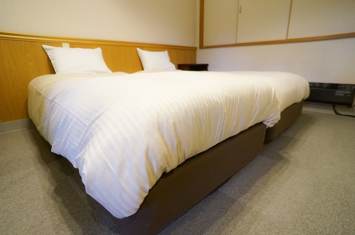 Imagen de la habitación del Hotel Hakuba M&auml;rchen House. Foto 13