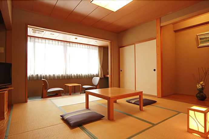 Imagen de la habitación del Hotel Hakuba Ougiya. Foto 11
