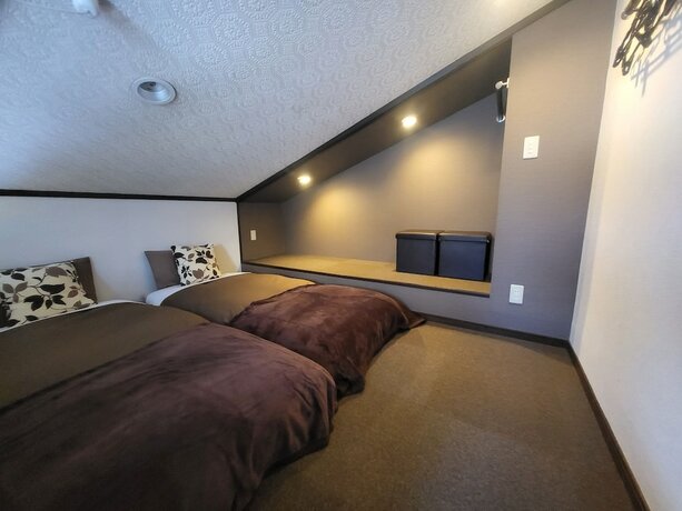 Imagen de la habitación del Hotel Hakuba Powder Lodge. Foto 21