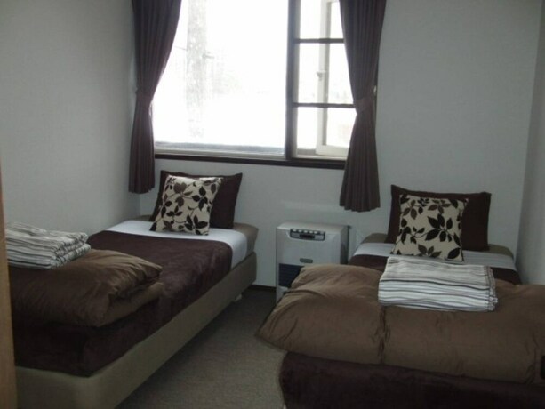 Imagen de la habitación del Hotel Hakuba Powder Lodge. Foto 22