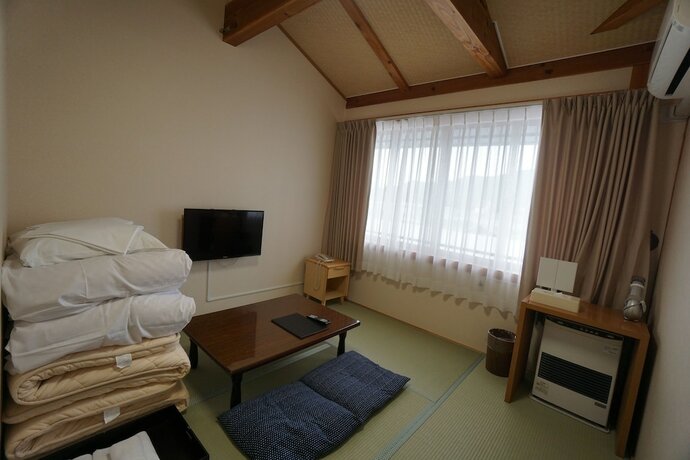 Imagen de la habitación del Hotel Hakuba Ryujin Onsen. Foto 18