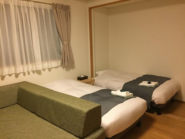 Imagen de la habitación del Hotel Hakuba Ryujin Onsen. Foto 28