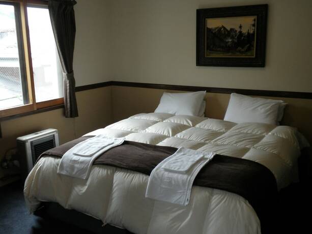 Imagen de la habitación del Hotel Hakuba Ski Condos. Foto 18