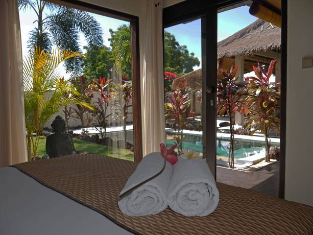 Imagen de la habitación del Hotel Hakuna Matata Bali Villas. Foto 9