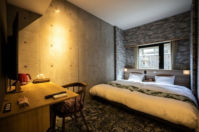 Imagen de la habitación del Hotel Hale Kyoto Tambaguchi. Foto 35