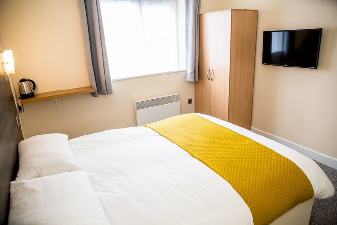 Imagen de la habitación del Hotel Halfway. Foto 19