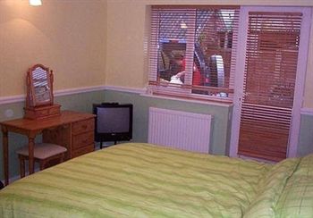 Imagen de la habitación del Hotel Halfway House Inn Country Lodge. Foto 5