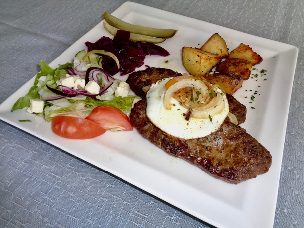 Imagen del bar/restaurante del Hotel Hali Country. Foto 6