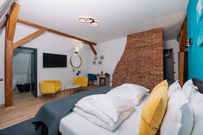 Imagen de la habitación del Hotel Haller Boutique. Foto 9
