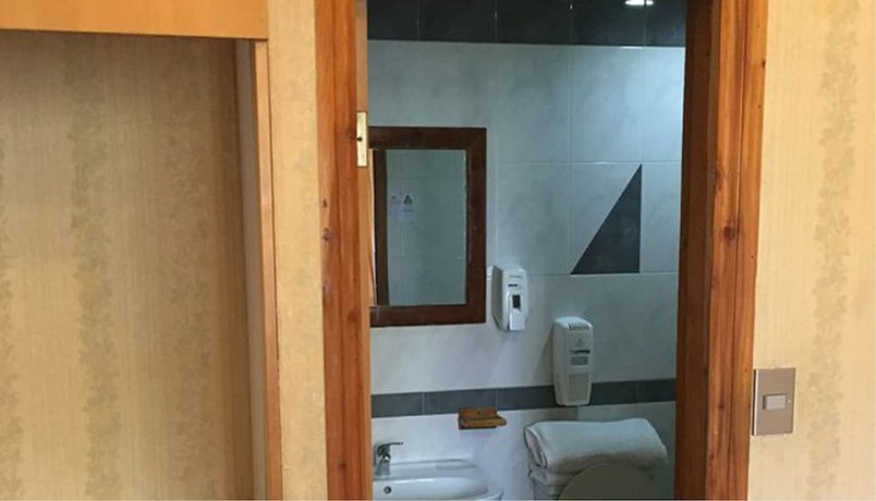 Imagen de la habitación del Hotel Halley. Foto 14