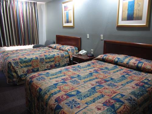 Imagen de la habitación del Hotel Hallmark Inn And Suites. Foto 3