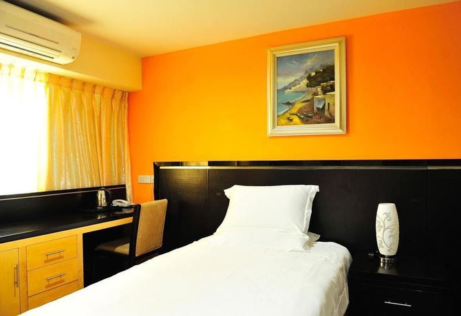 Imagen de la habitación del Hotel Hallmark Inn. Foto 7