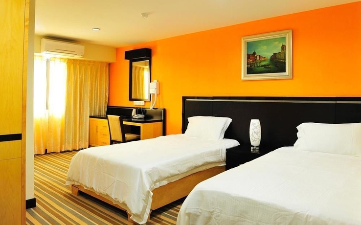 Imagen de la habitación del Hotel Hallmark Inn. Foto 8