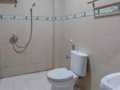 Imagen de la habitación del Hotel Halmahera Palangkaraya Redpartner. Foto 11