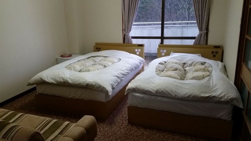 Imagen de la habitación del Hotel Hamasaka Onsen Totoya. Foto 11