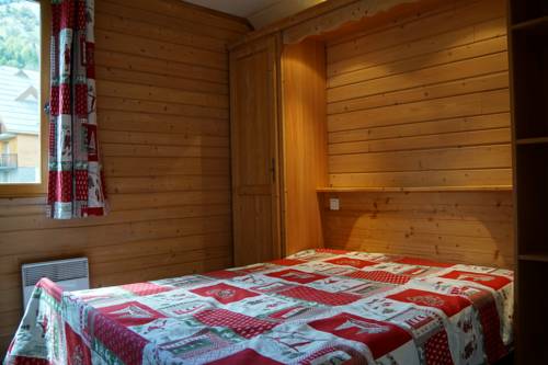 Imagen de la habitación del Hotel Hameau Pra Roustan By Godille. Foto 5
