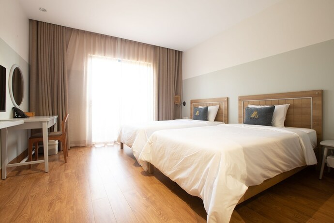 Imagen de la habitación del Hotel Hami Garden. Foto 12