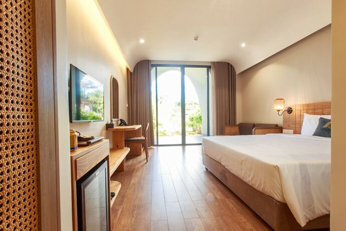 Imagen de la habitación del Hotel Hami Garden. Foto 13