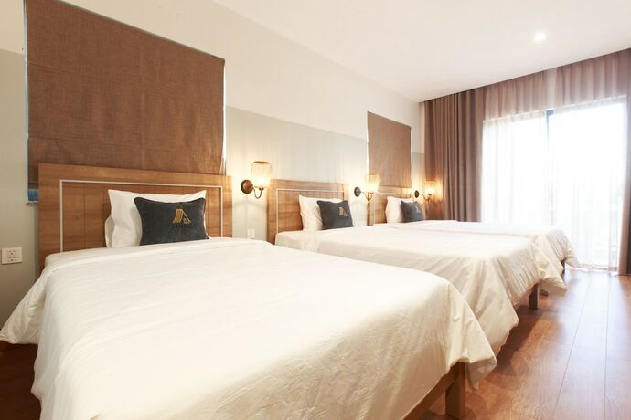 Imagen de la habitación del Hotel Hami Garden. Foto 14