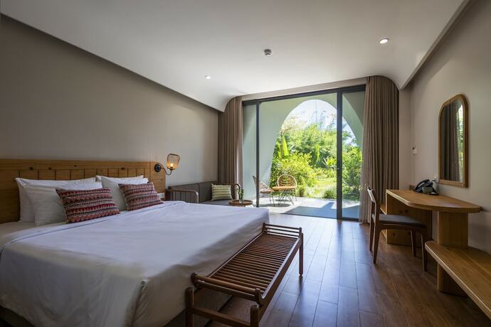 Imagen de la habitación del Hotel Hami Garden. Foto 15