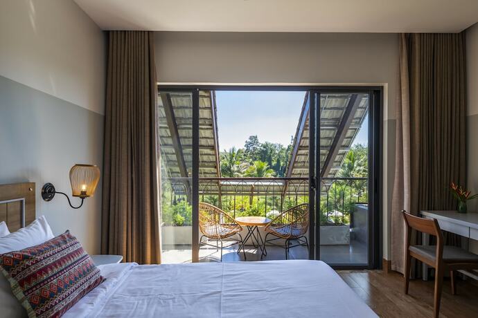 Imagen de la habitación del Hotel Hami Garden. Foto 16