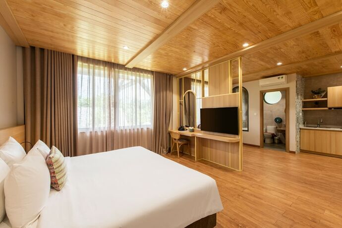 Imagen de la habitación del Hotel Hami Garden. Foto 17