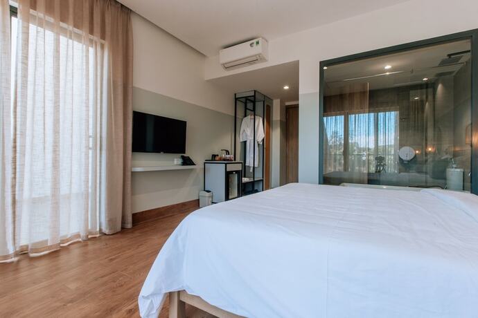 Imagen de la habitación del Hotel Hami Garden. Foto 19