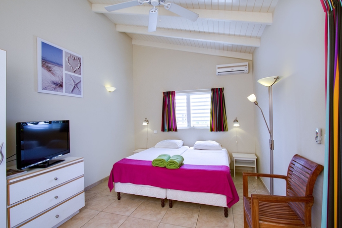 Imagen de la habitación del Hotel Hamlet Oasis Resort. Foto 2
