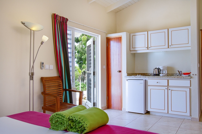 Imagen de la habitación del Hotel Hamlet Oasis Resort. Foto 3