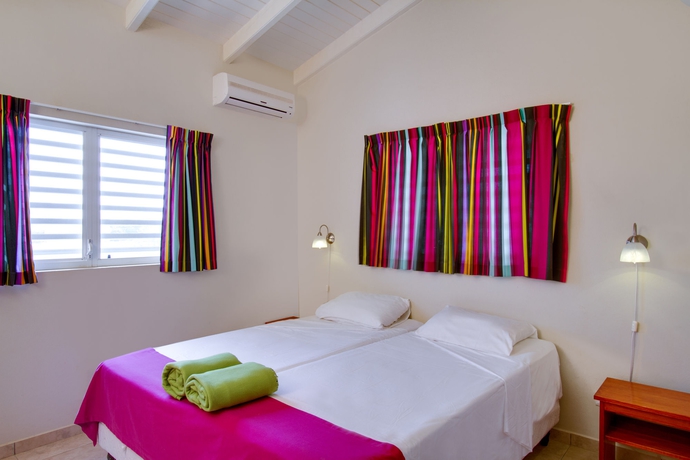 Imagen de la habitación del Hotel Hamlet Oasis Resort. Foto 5