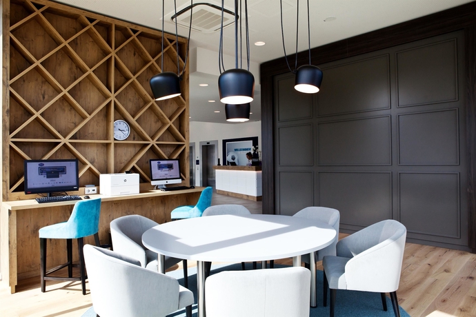 Imagen de los interiores del Hotel Hampton By Hilton Aachen Tivoli. Foto 18