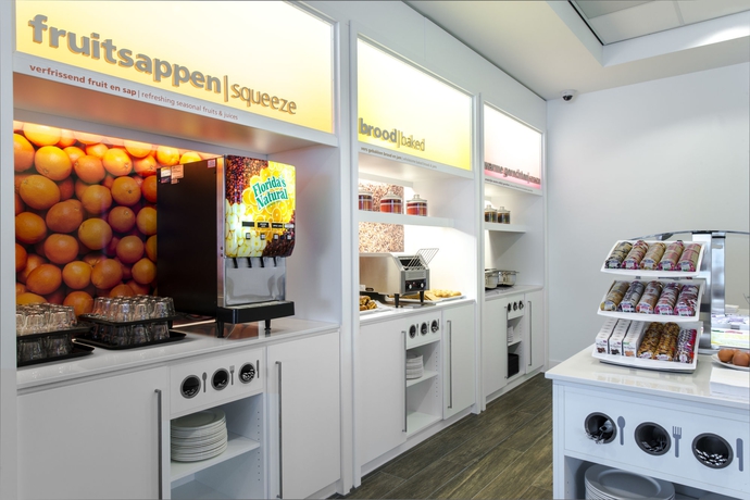 Imagen del bar/restaurante del Hotel Hampton By Hilton Amsterdam Airport Schiphol. Foto 4