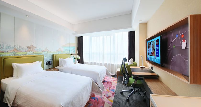 Imagen de la habitación del Hotel Hampton By Hilton Foshan Shanshui. Foto 12