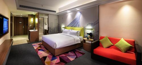 Imagen de la habitación del Hotel Hampton By Hilton Guangzhou Zhujiang New Town. Foto 6